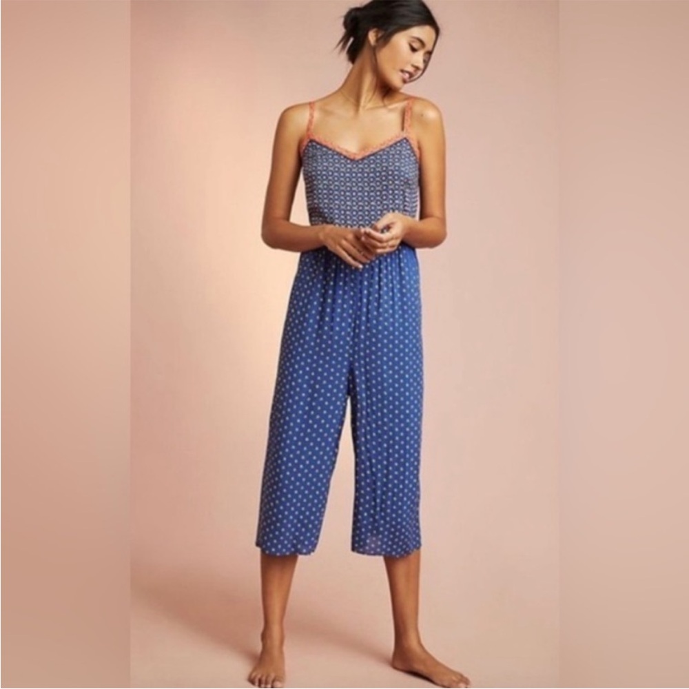 Anthropologie • Sleeveless Blue Orange Button
Back Floral Jumpsuit Size Small